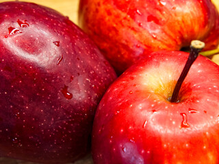 Red Apples Water Drops. Juicy apples with water drops, ideal for fruit market ads.