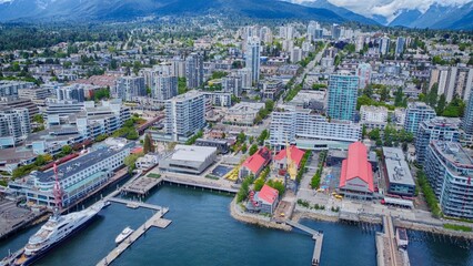 Wide aerial view of The Shipyards District and Lower Lonsdale in North Vancouver