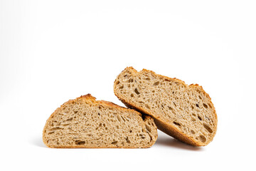 A loaf of sourdough bread cut in half