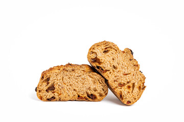 A loaf of sourdough bread with sun-dried tomato cut in half
