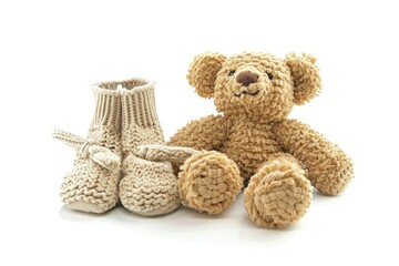Teddy Bear and Knitted Baby Booties.