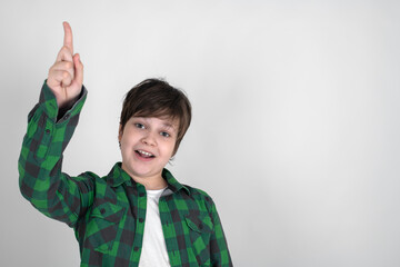 eureka,  happy boy  is surprised, inspired, i have an idea, raise your index finger up