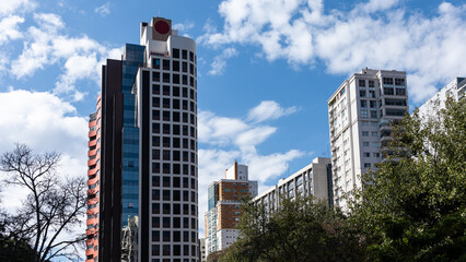 Obraz premium city buildings under blue sky