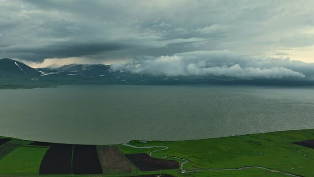 Aerial view of largest Paravani lake in Georgia, Samtskhe-Javakheti region. drone shot captures the stunning volcanic landscape, also known as Georgian Arctic.