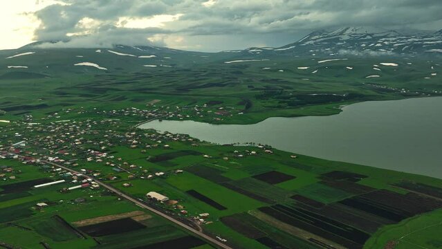 Aerial view of largest Paravani lake in Georgia, Samtskhe-Javakheti region. drone shot captures the stunning volcanic landscape, also known as Georgian Arctic.