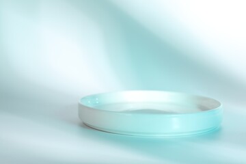 Presentation of product. Podium on light blue background, space for text