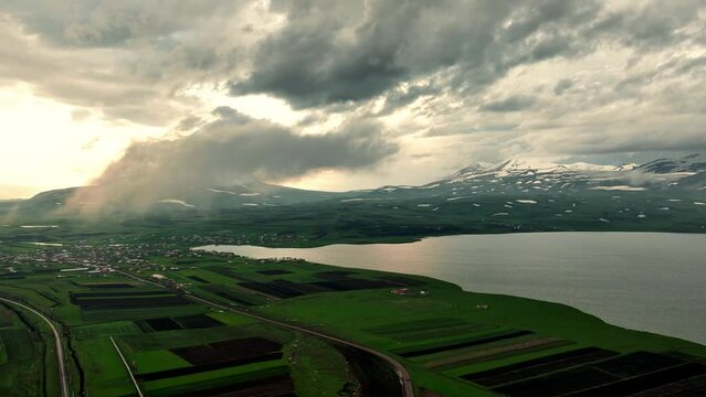 Aerial view of largest Paravani lake in Georgia, Samtskhe-Javakheti region. drone shot captures the stunning volcanic landscape, also known as Georgian Arctic.