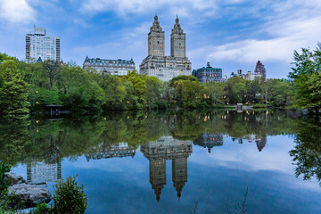 Manhattan skyscrapers and Central Park meadow, New York City.