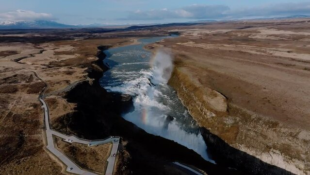 Aerial view of Gullfoss waterfall in Iceland, one of the most popular tourist destinations. Experience the breathtaking natural beauty and powerful cascades of Iceland's iconic waterfall.