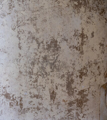 Aging Grace: Textured White Paint Peeling on Wall