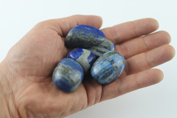 A polished block of lapis lazuli. Crystals of lazurite (the main mineral in lapis lazuli). 