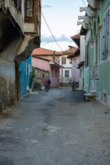 Traditional Kula houses with wooden structure in Turkish and Ottoman architectural style, Manisa, Türkiye. Historical buildings and houses on the streets of Manisa.