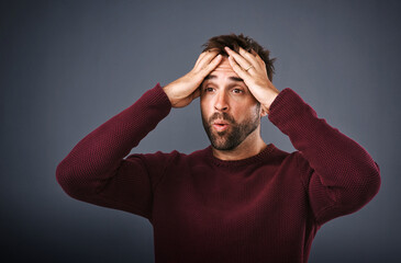 Shocked, man and reaction for news, studio and wow for gossip of secret, campaign drama and mockup....