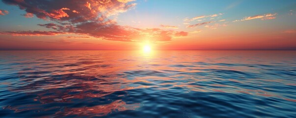 Fototapeta premium Sun setting over a calm ocean horizon