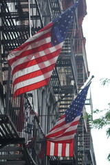 american flag in the city