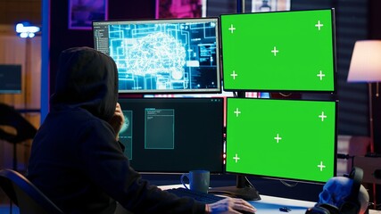 Rogue computer scientist uses AI deep learning and green screen PC to develop malware. Hacker uses...
