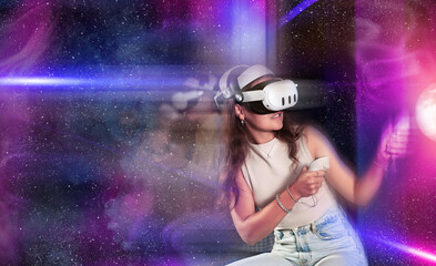 Stylized shot of young girl with VR goggles and controllers, immersed in futuristic virtual reality...