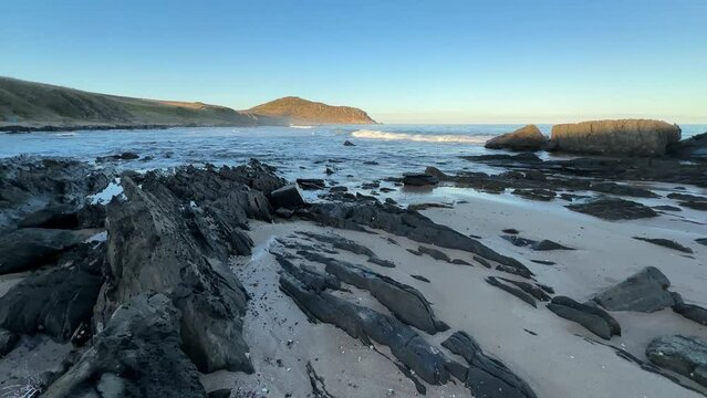 Landscape 4k footage of the rocks and ocean in front of Rosetta Head on the Victor Harbor Heritage Trail on the Fleurieu Peninsula in South Australia