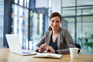 Laptop, happy and portrait of business woman in office for career or corporate job in Spain. Face, secretary and smile of confident professional entrepreneur, employee and receptionist with book