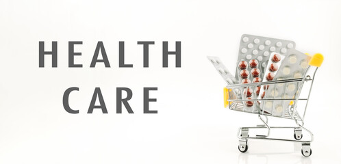 A cart full of medicine is labeled health care