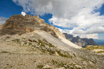 Fototapeta premium Amazing views of the picturesque high Dolomites mountains, lawns and summer forest