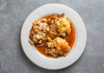 Baked cauliflower with bechamel sauce.​
