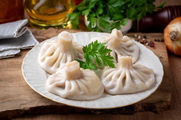 Traditional Georgian dish khinkali - Hinkali  - Boiled khinkali with lamb or beef or cheese