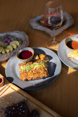 A restaurant table with various plates showcasing dishes prepared for a meal