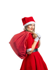 Young Latina dressed as Mama Noel carrying a bag with gifts looking at camera