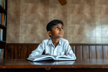 World of Wonders: Young Reader in a Library