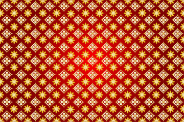 Golden floral and ethnic Thai pattern on an abstract red background.