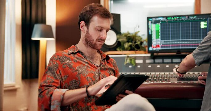 Sound engineer, thinking and tablet in studio for music, production and collaboration with equipment. Mix desk, producer and artist with digital technology for edm, idea and teamwork for composition