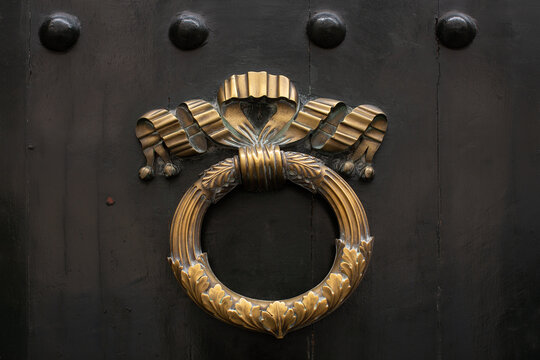 Ornate brass metal door knocker
