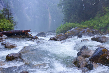 Rush of water rapids over rocks