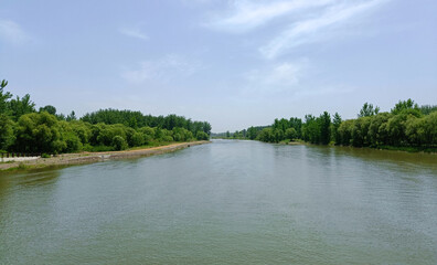 Fototapeta premium China, Luoyang, Longmen Grottoes, river bank near the grottoes 