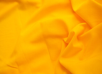 Obraz premium Yellow Background Cloth Fabric Orange Color Gradient Texture Pattern Silk Wave Banner Gold, Fashion Material Backdrop Poster for Summer Tropical Travel Holidays, Satin Mockup Luxury Premium.