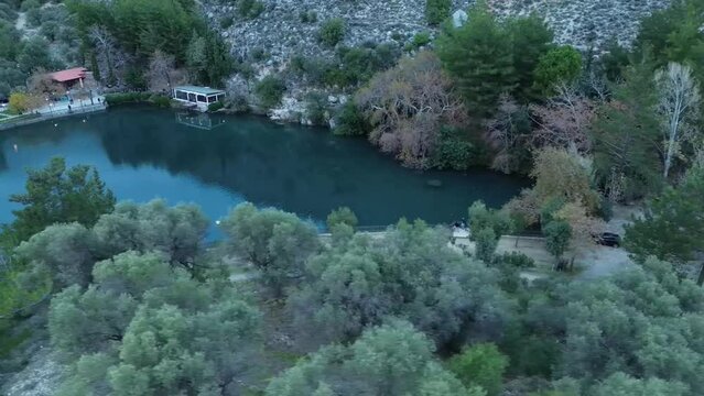 Evening aerial video over Lake Zaros on the island of Crete, Greece.