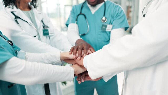 Medical, collaboration and hands in circle for teamwork, unity and together in hospital for work. Doctors, employees and healthcare diversity in a huddle for solidarity, help and support in medicine