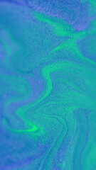 Glitter ink wave. Wet shimmer texture. Defocused neon green blue color shiny sand particles paint liquid spill pigment fluid flow abstract art background.