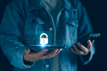 Cybersecurity and privacy concepts to protect data. Lock icon and internet network security technology. Businessman protecting personal data on computer, virtual screen interfaces. Cybersecurity.