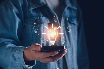 Business solution idea concept. Businessman  creative light bulbs with marketing network, planning strategy, analysis solution and development, modern business technology, Innovative of new idea.