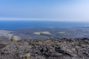 Mauna Ulu lava flows 1969 to 1974, Hawaii Volcanoes National Park, The Hilina Pali (cliff) on...