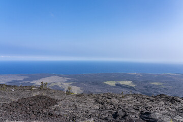 Mauna Ulu lava flows 1969 to 1974, Hawaii Volcanoes National Park, The Hilina Pali (cliff) on...