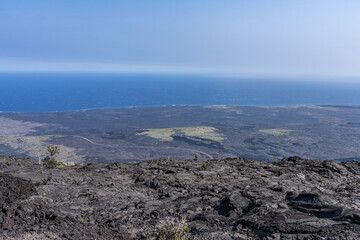 Mauna Ulu lava flows 1969 to 1974, Hawaii Volcanoes National Park, The Hilina Pali (cliff) on...
