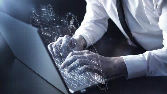 A man on a laptop works with an AI.