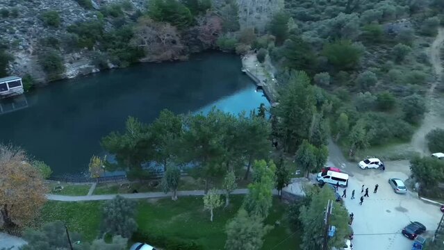 Evening aerial video over Lake Zaros on the island of Crete, Greece.