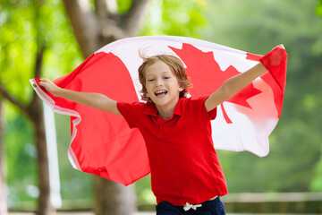 Child with Canadian flag. Happy Canada day