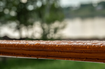 The balcony railing with rain drops. Template for inspiration and creativity, mood board.