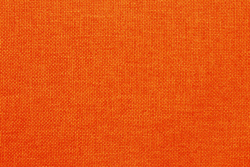 Orange fabric cloth texture background, seamless pattern of natural textile.