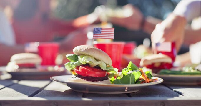 American flag, food and celebration of independence day outdoor with vegetables, bbq burger and lunch for culture. Picnic, party and barbecue, government memorial day and freedom of democracy rights